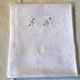 Square linen tablecloth marked RA