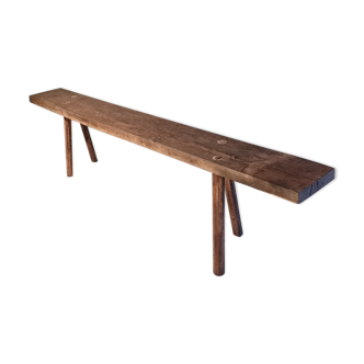 Banc ancien brut en bois massif