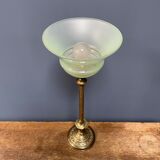 Ornate brass table lamp with mint green glass shade