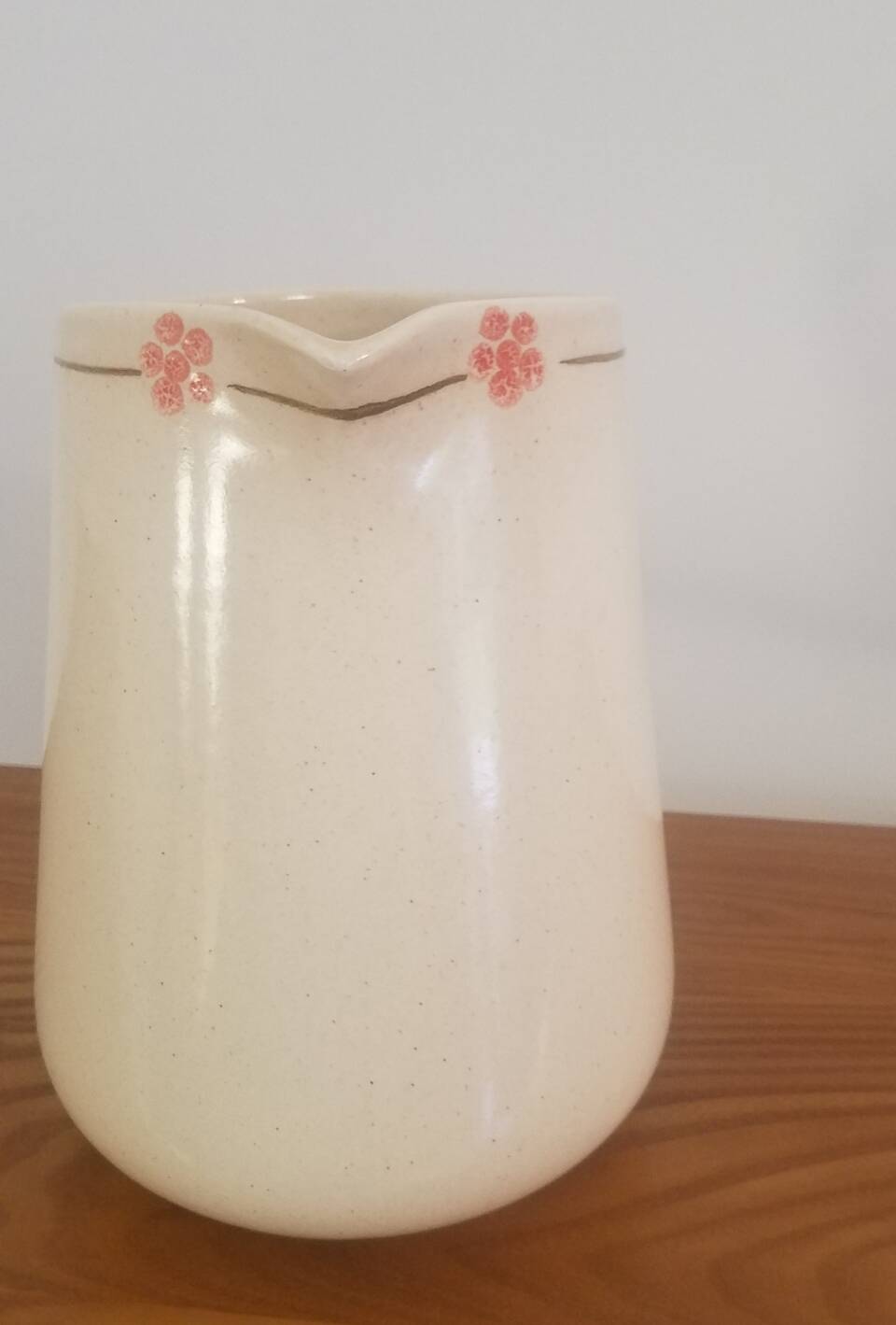 Hand-painted glazed ceramic pitcher