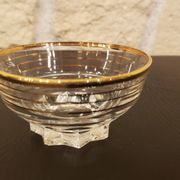 Set of 17 elegant bowls with gold rims