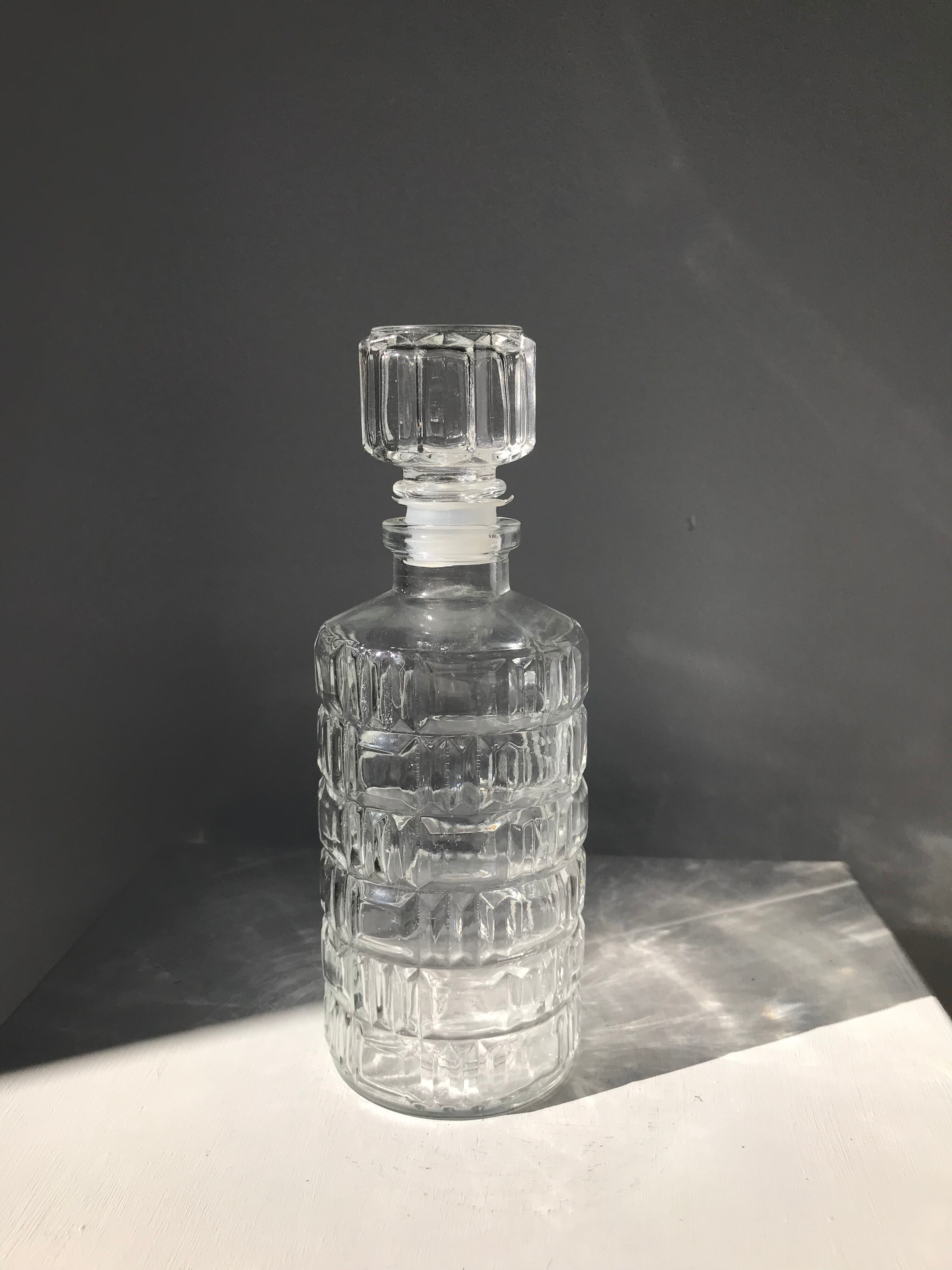 Vintage whisky decanter in glass