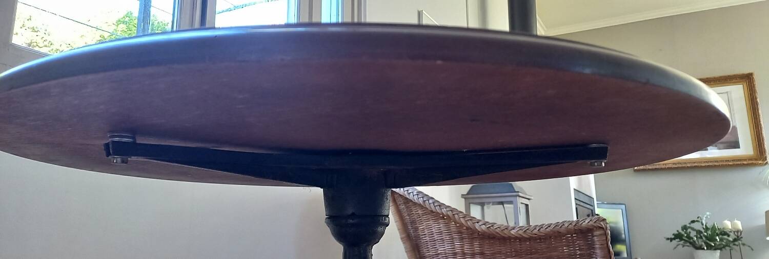 Round wooden bistro table