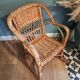 Vintage rattan children's rocking chair