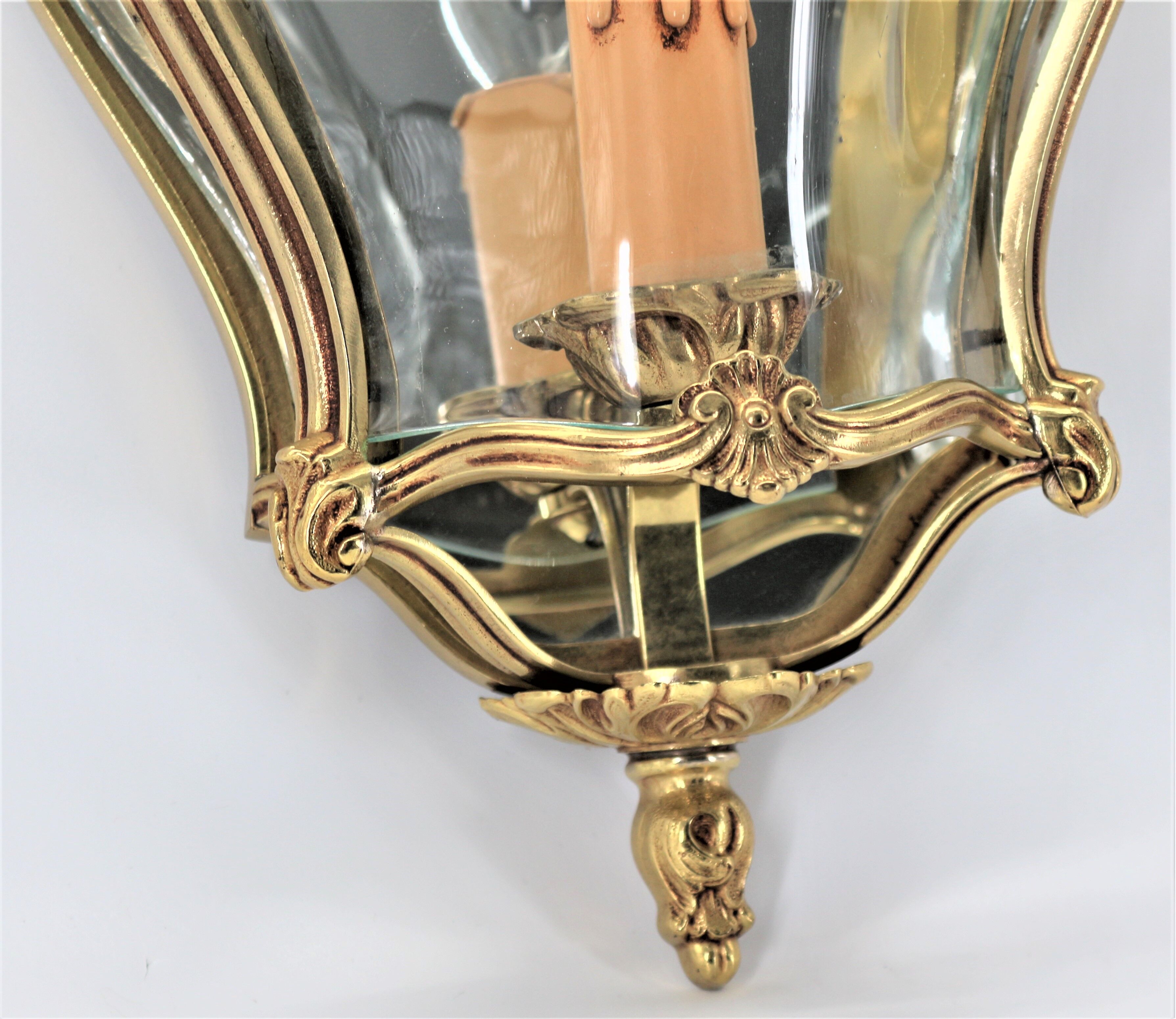 Pair of Louis XV style appliques in solid bronze & curved glass