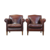 Set of 2 design armchairs made of sheepskin