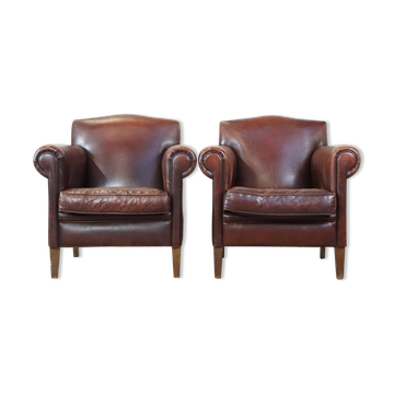 Set of 2 design armchairs made of sheepskin