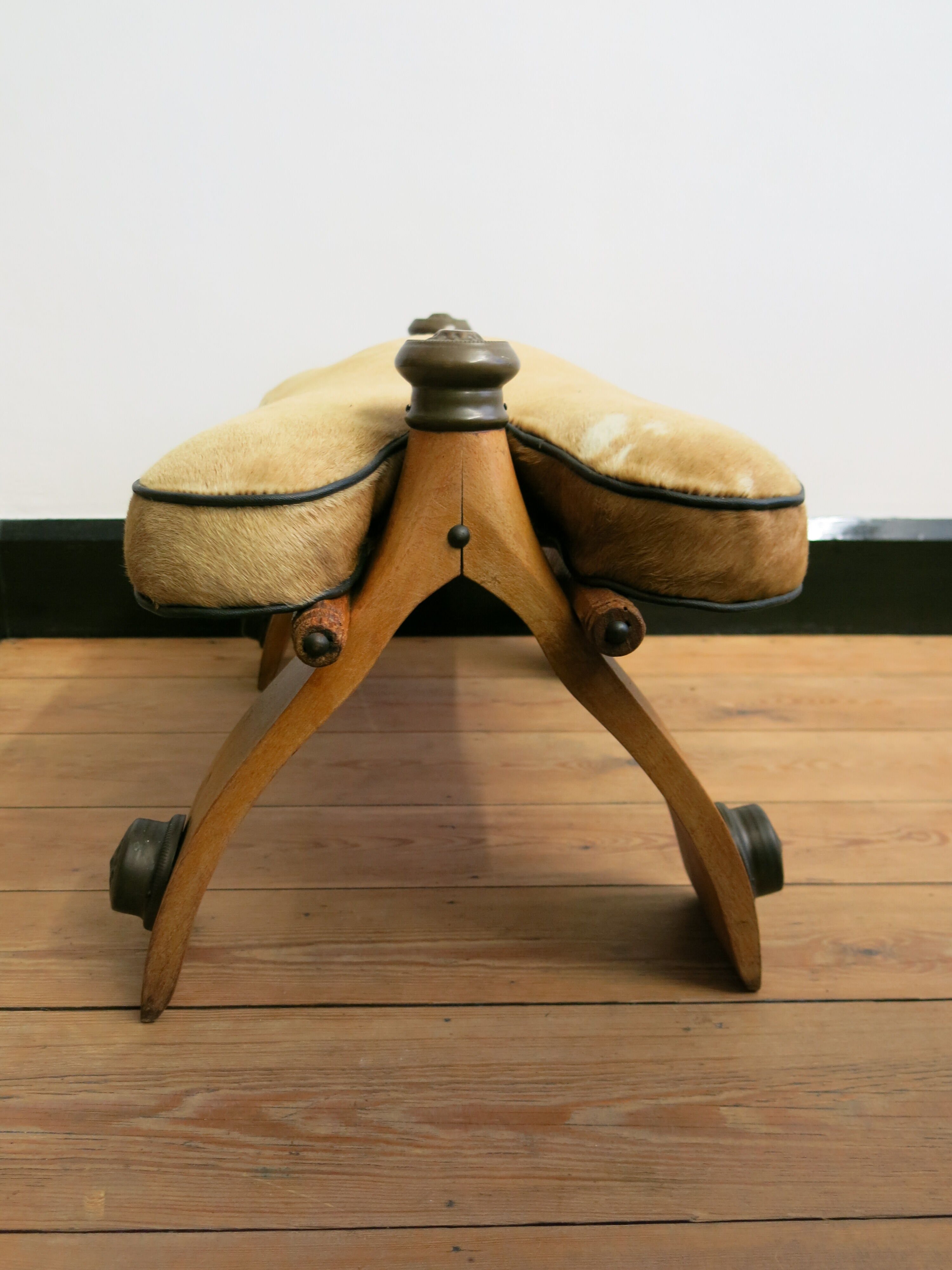 Camel saddle stool