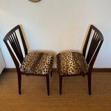 Pair of vintage wood and leopard chairs