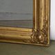 Louis-Philippe mirror from the 19th century with foliage and grape cluster motifs.