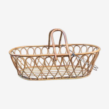 Rattan bassinet with hood arches