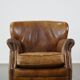 Cognac-colored subtle armchair