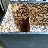 Trunk, black wooden chest and wallpaper