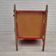 Chaise à bascule danoise des années 1960, d'origine en bon état, bois de chêne massif, tissu en laine d'ameublement.