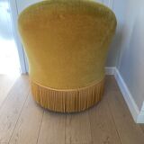 Velvet armchair with fringes