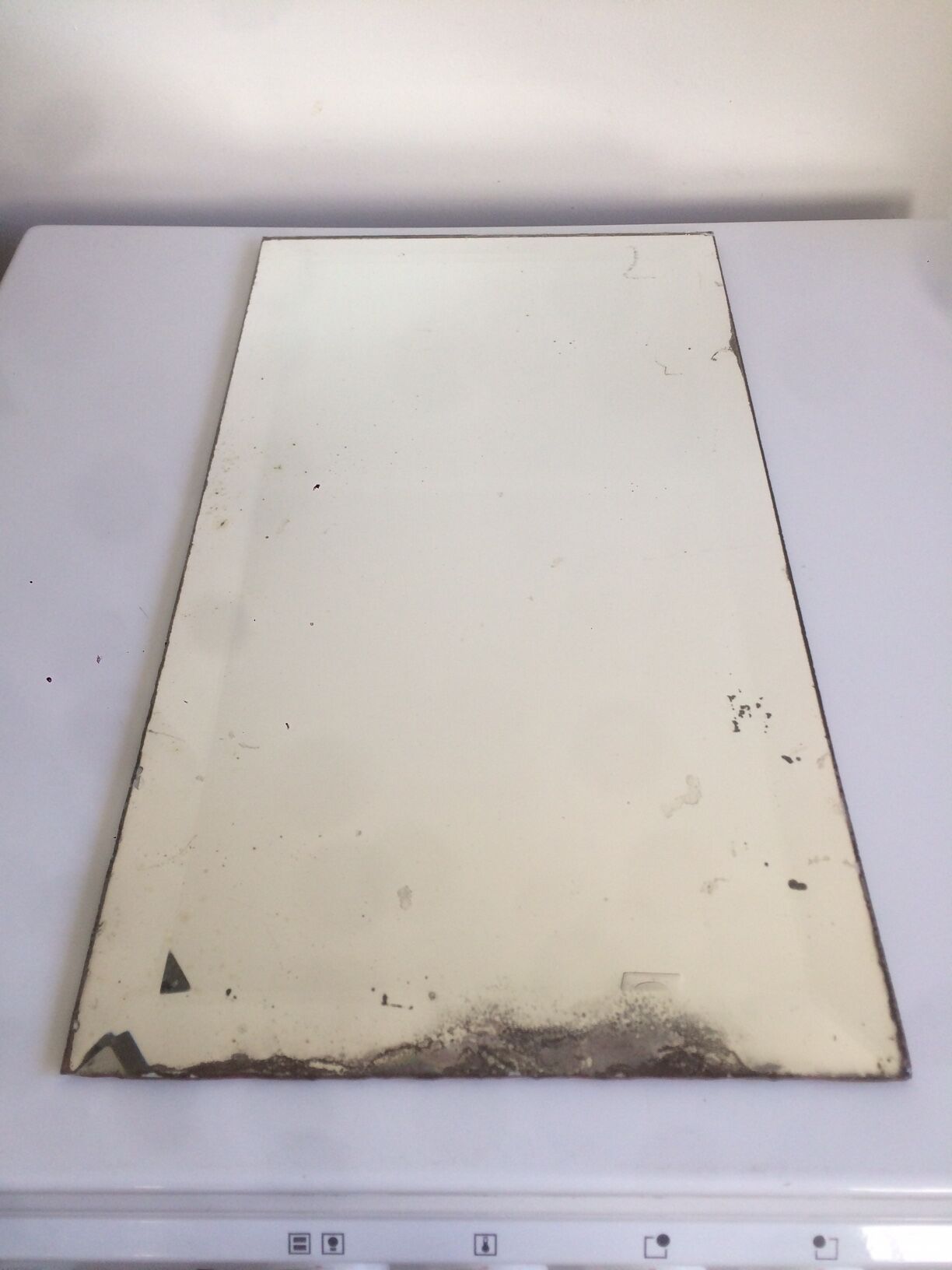 Old bevelled mirror 51x27,5cm