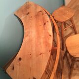 Vintage bar counter with natural wood stools