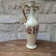 Antique amphora-shaped vase with Roman or Greek decoration