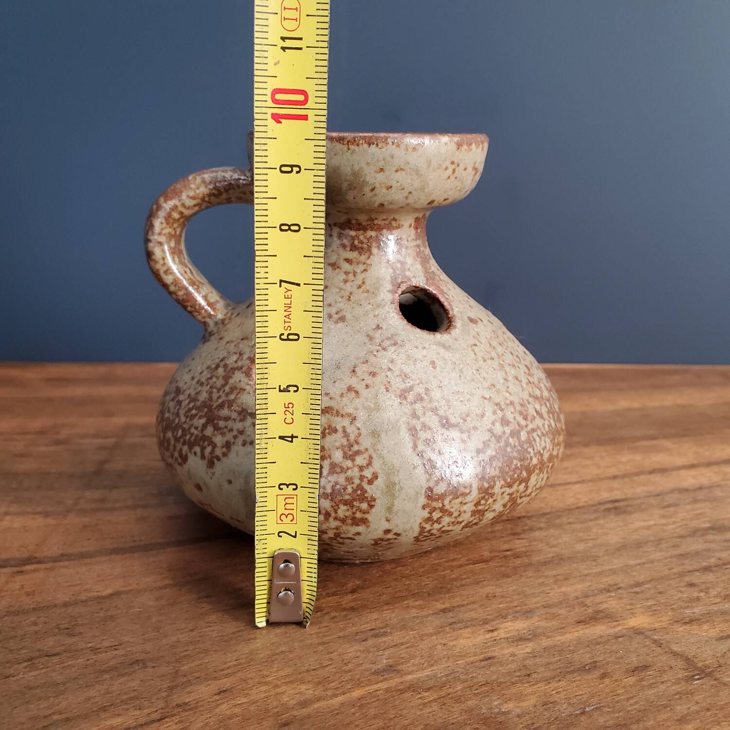 Stoneware cellar rat candle holder