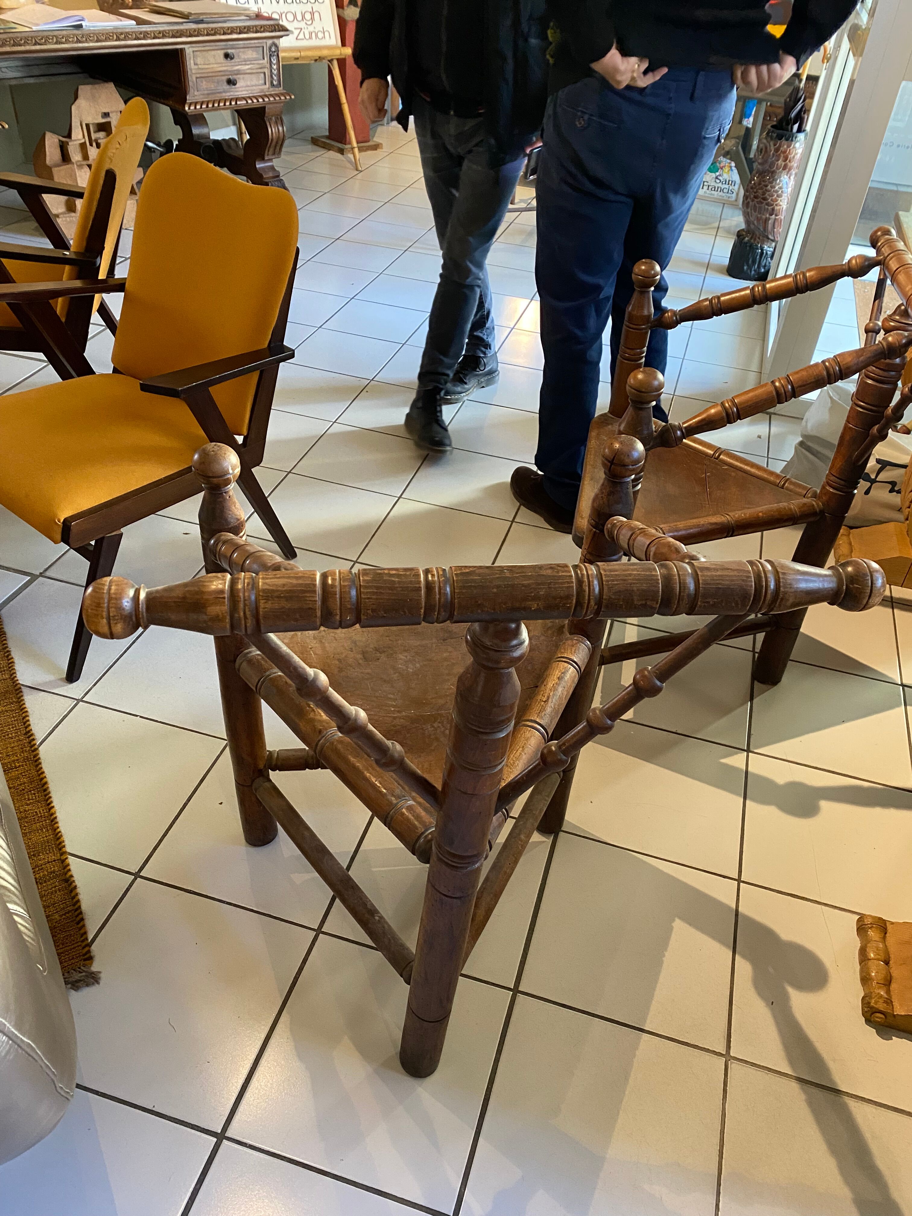 Pair of tripod turner chairs