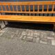 Old wooden long station bench from Belgium