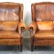 Set of 2 beautiful and correct sheep leather wingback armchairs with fixed seat cushions