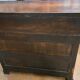 Vintage wooden toilet commode with marble top.