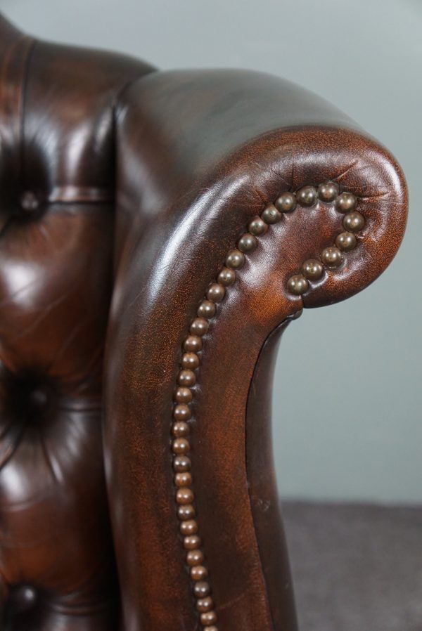 Chesterfield armchair with armrests