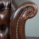 Chesterfield armchair with armrests