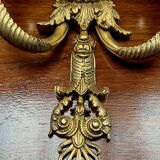 Paire d'appliques en bronze massif doré.