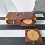 Wooden and cork coasters with brass inlay, decoration