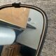 Asymmetrical free-form mirror from the 60s and 70s