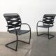 Set of vintage Italian postmodern cantilever armchairs Canasta by Heron Parigi for Heron Parigi Design.
