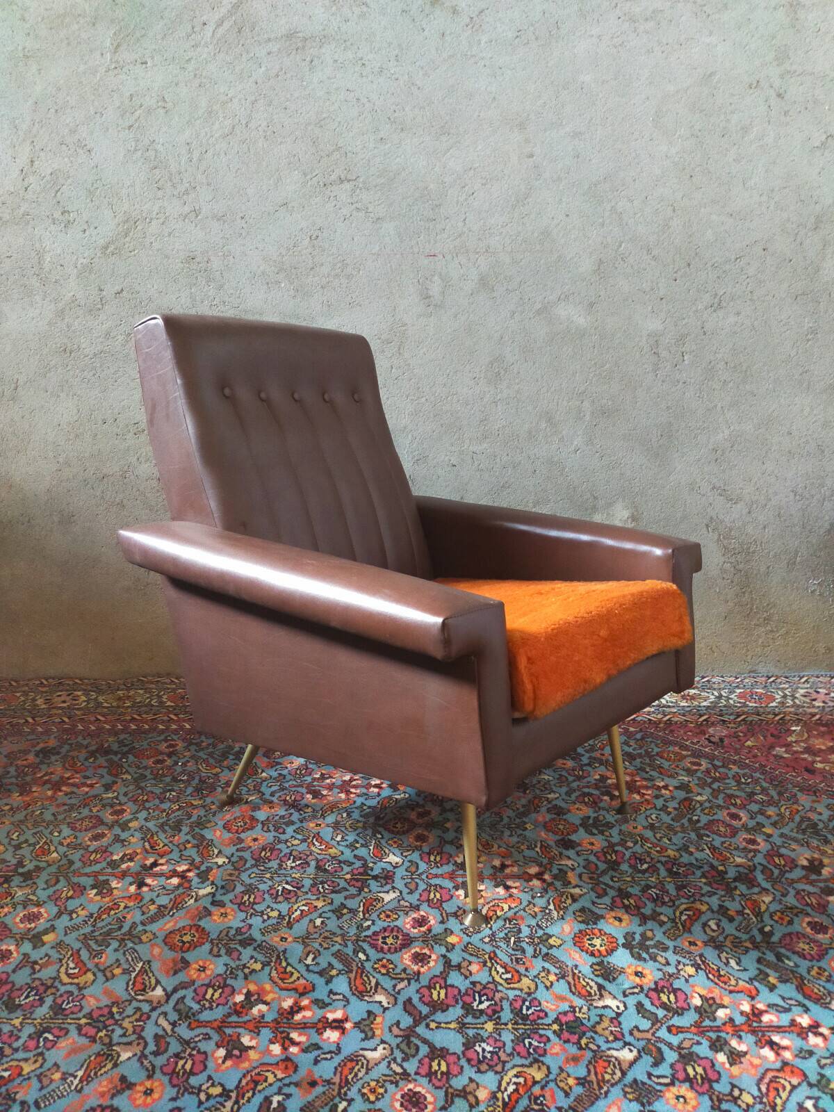 Vintage armchair in faux leather