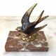 Marble swallow and brass paperweight