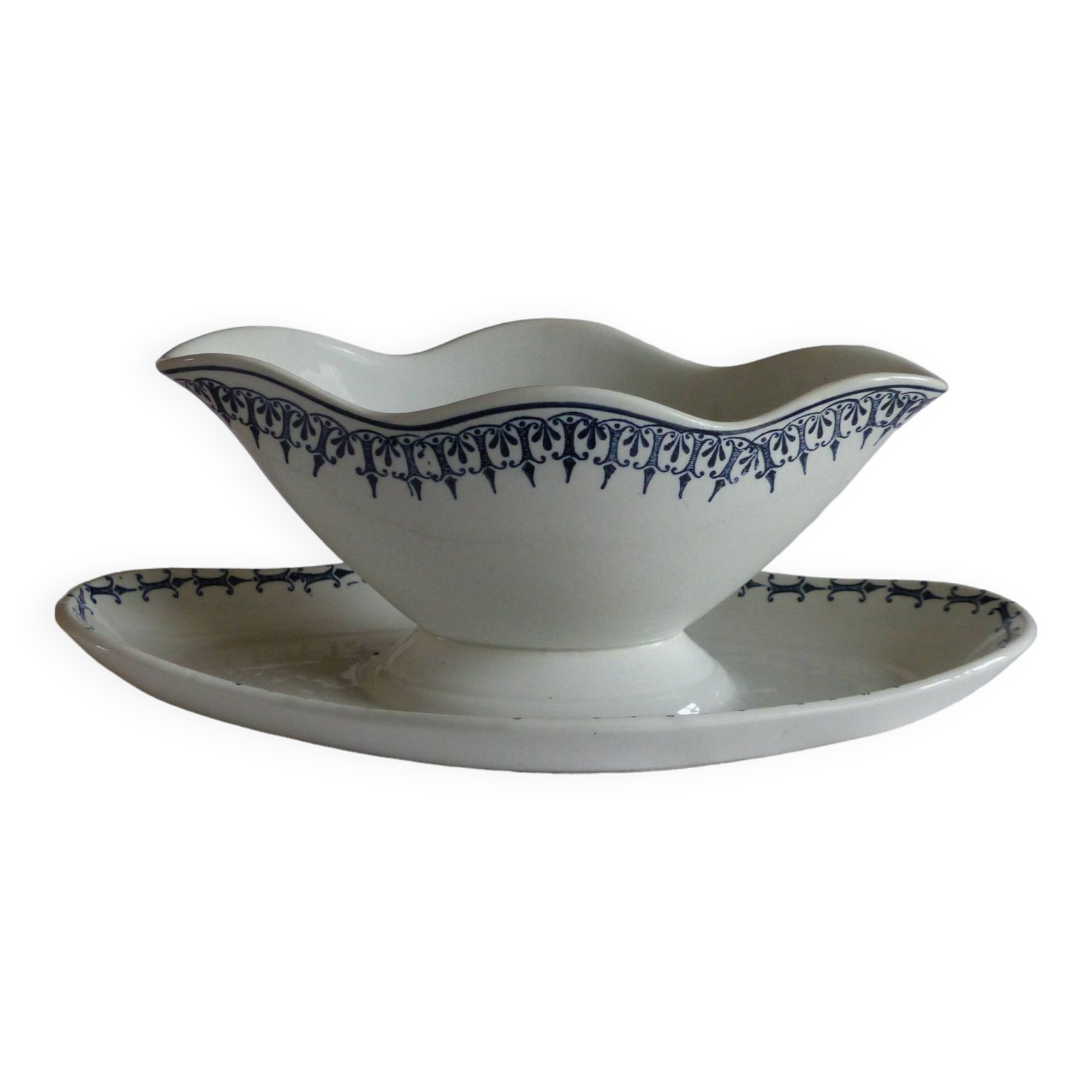 Earthenware gravy boat from Saint Amand.