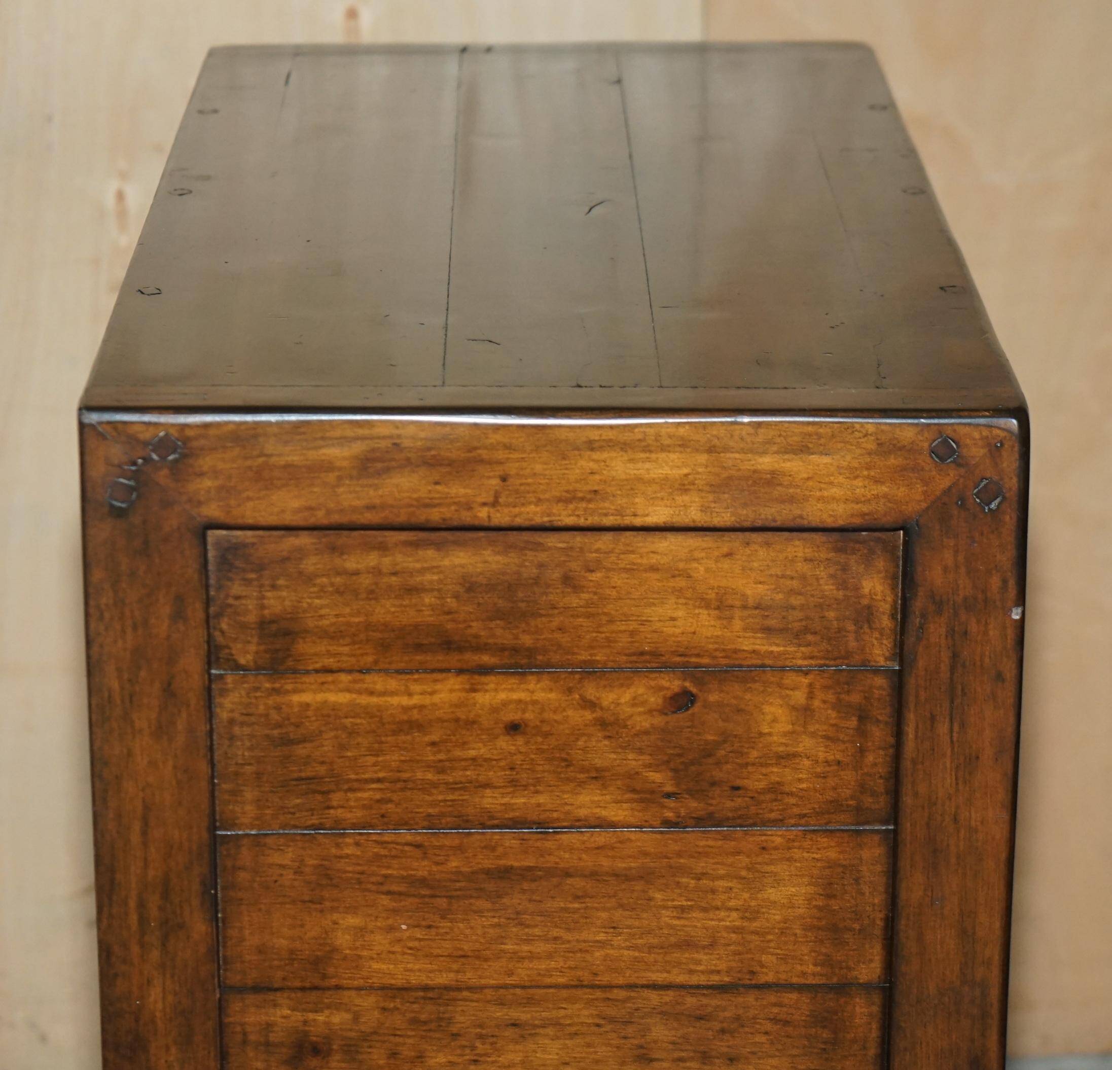 Large vintage hardwood furniture in military country style.