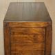 Large vintage hardwood furniture in military country style.