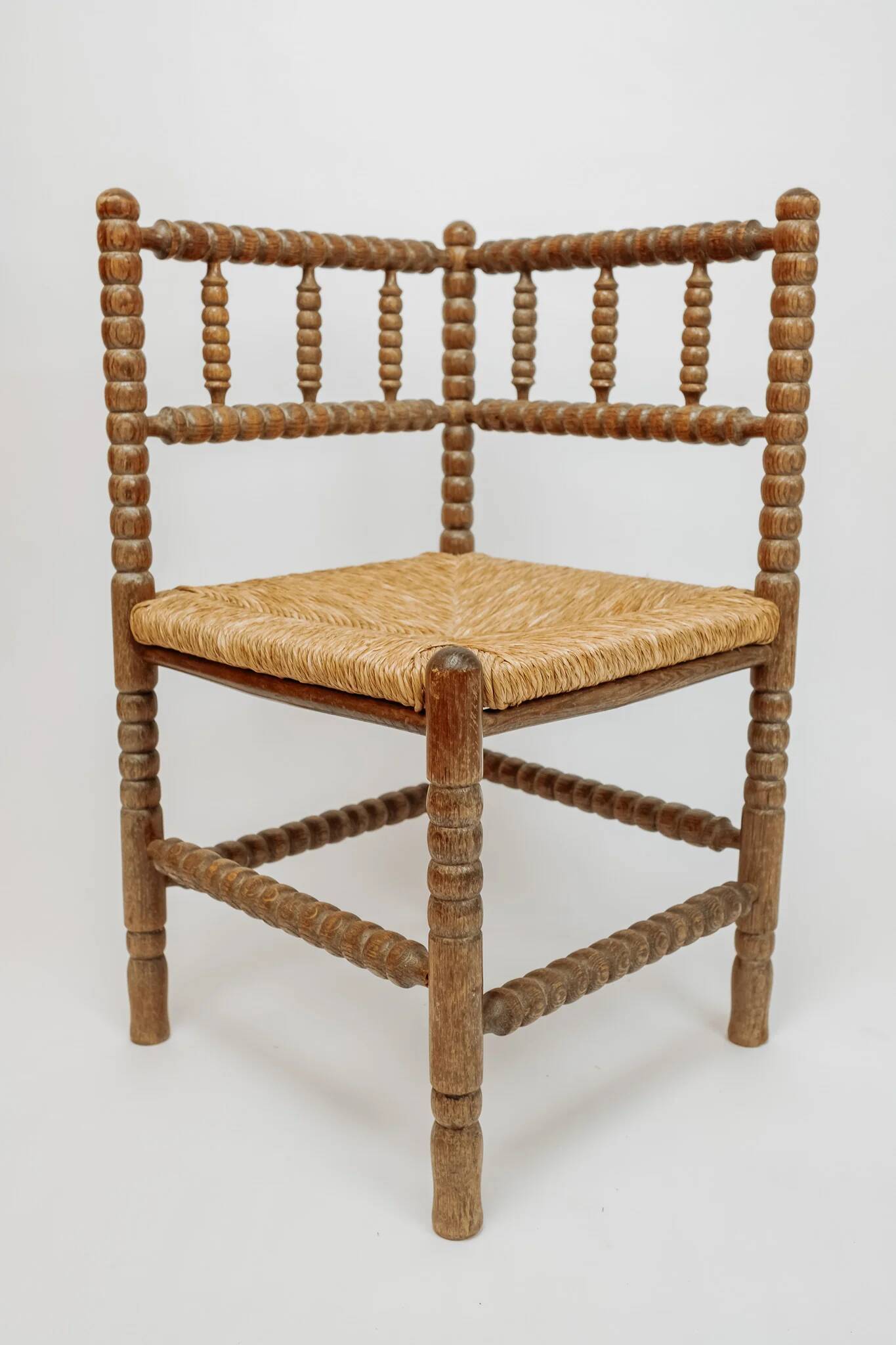 Classic vintage bobbin corner armchair