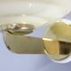 Pair of Czechoslovak Art Deco wall sconces from the 1940s in brass with opaline glass shades.