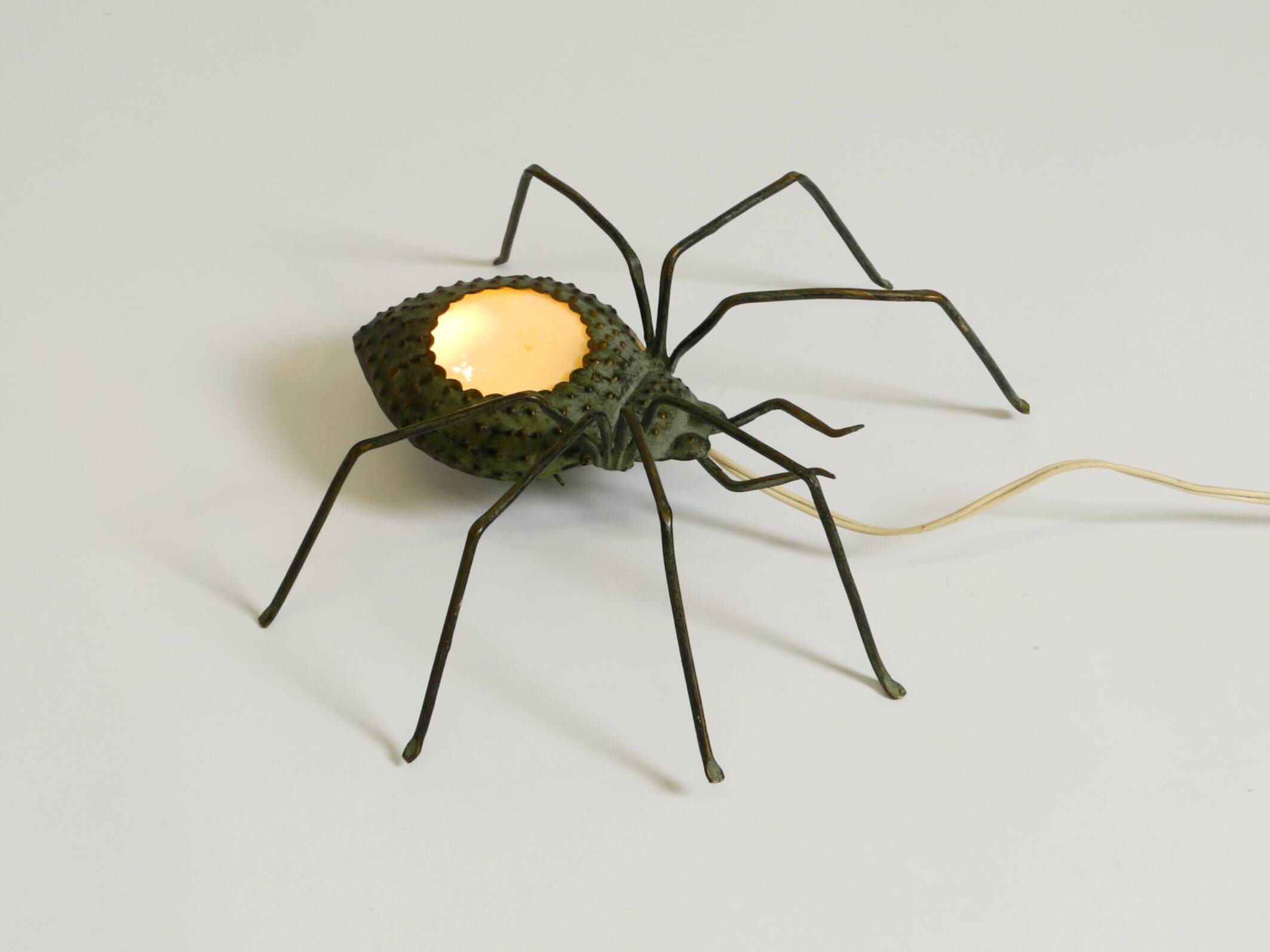Beautiful Italian Mid Century Modern "Spider" wall lamp made of metal