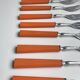 Set of 12 orange dessert forks in Bakelite and Tinplate 60s-70s