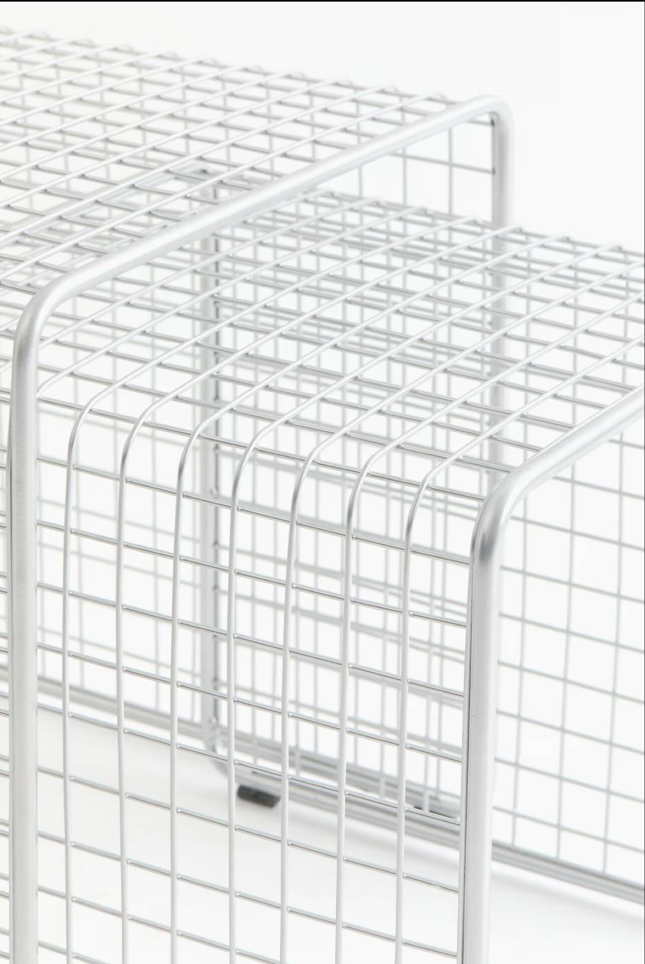 Nest of silver metal side tables