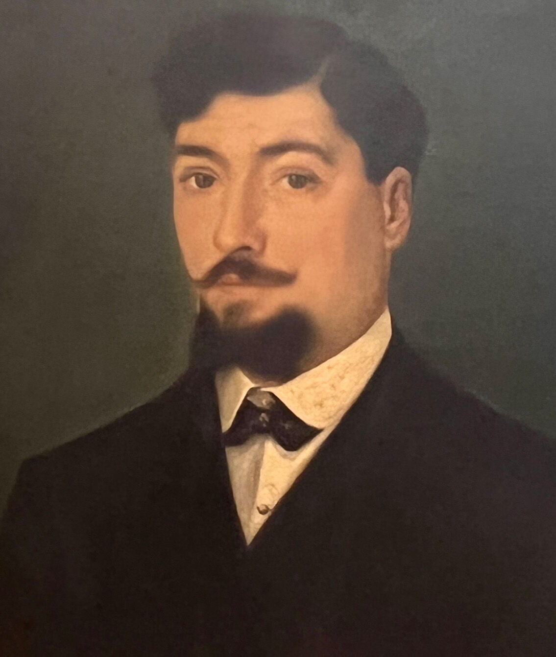 Oil on canvas of a mustachioed man