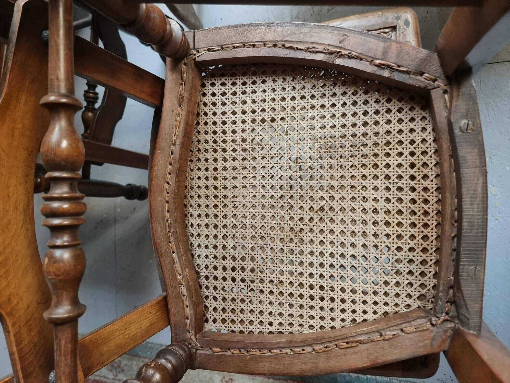 Set of 4 antique dining chairs with caned seats, beech, France, circa 1900–1920.
