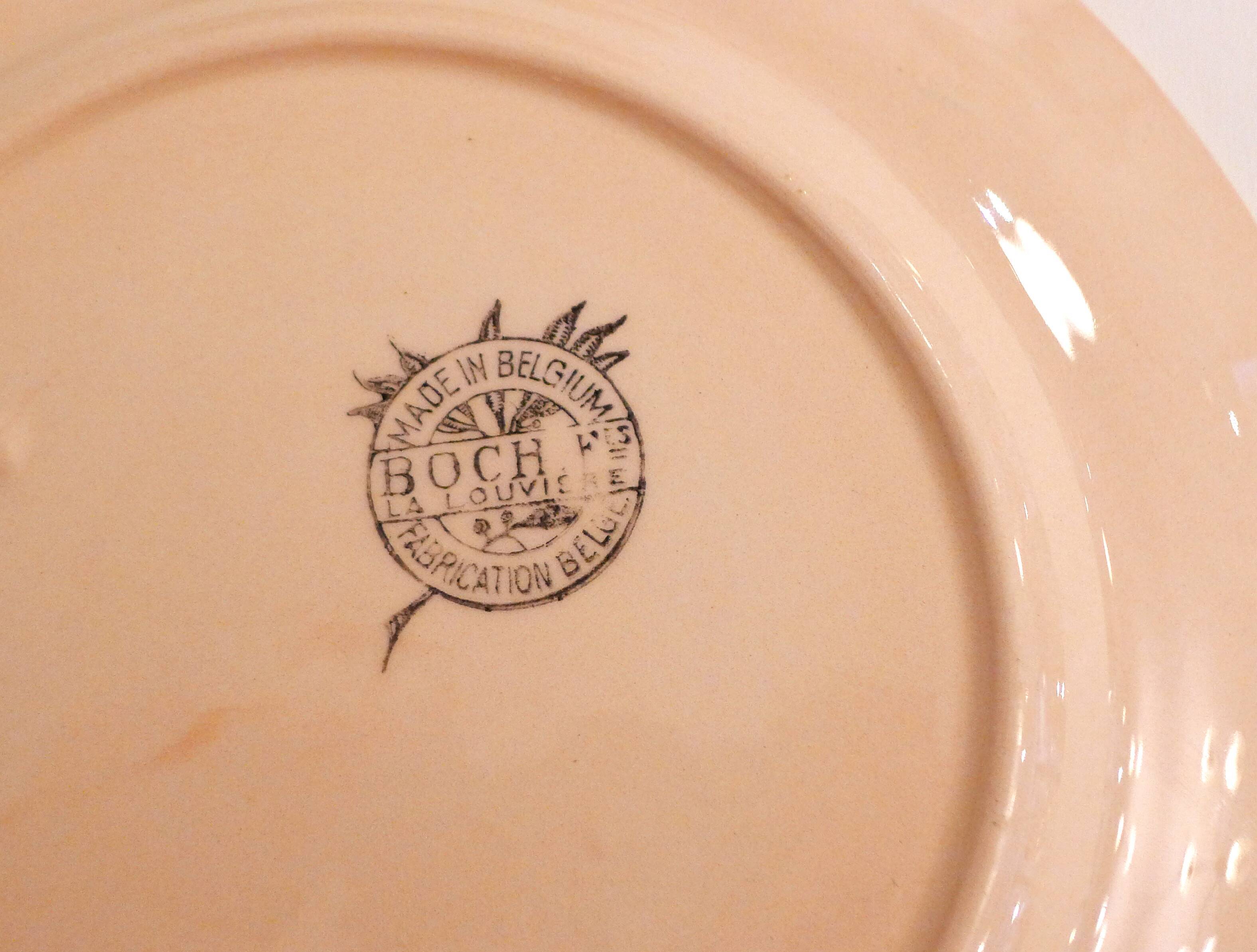 Set of 9 pink plates by Boch la Louvière