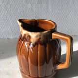 Small brown ceramic pitcher