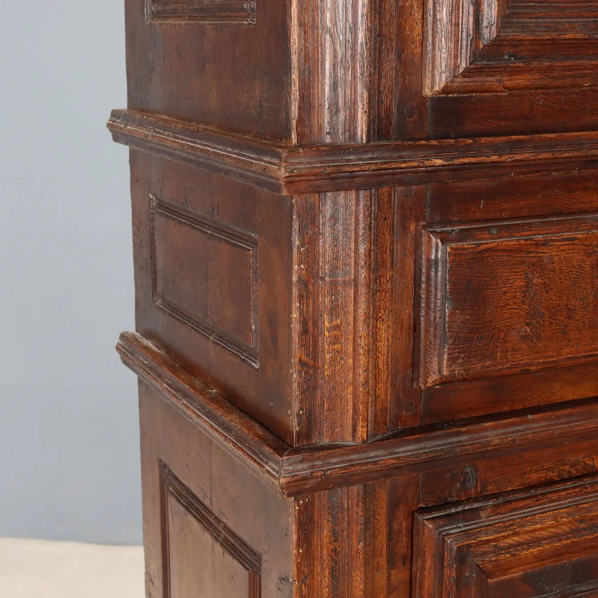 Antique baroque wardrobe in oak with safe, Italy, late 19th century.