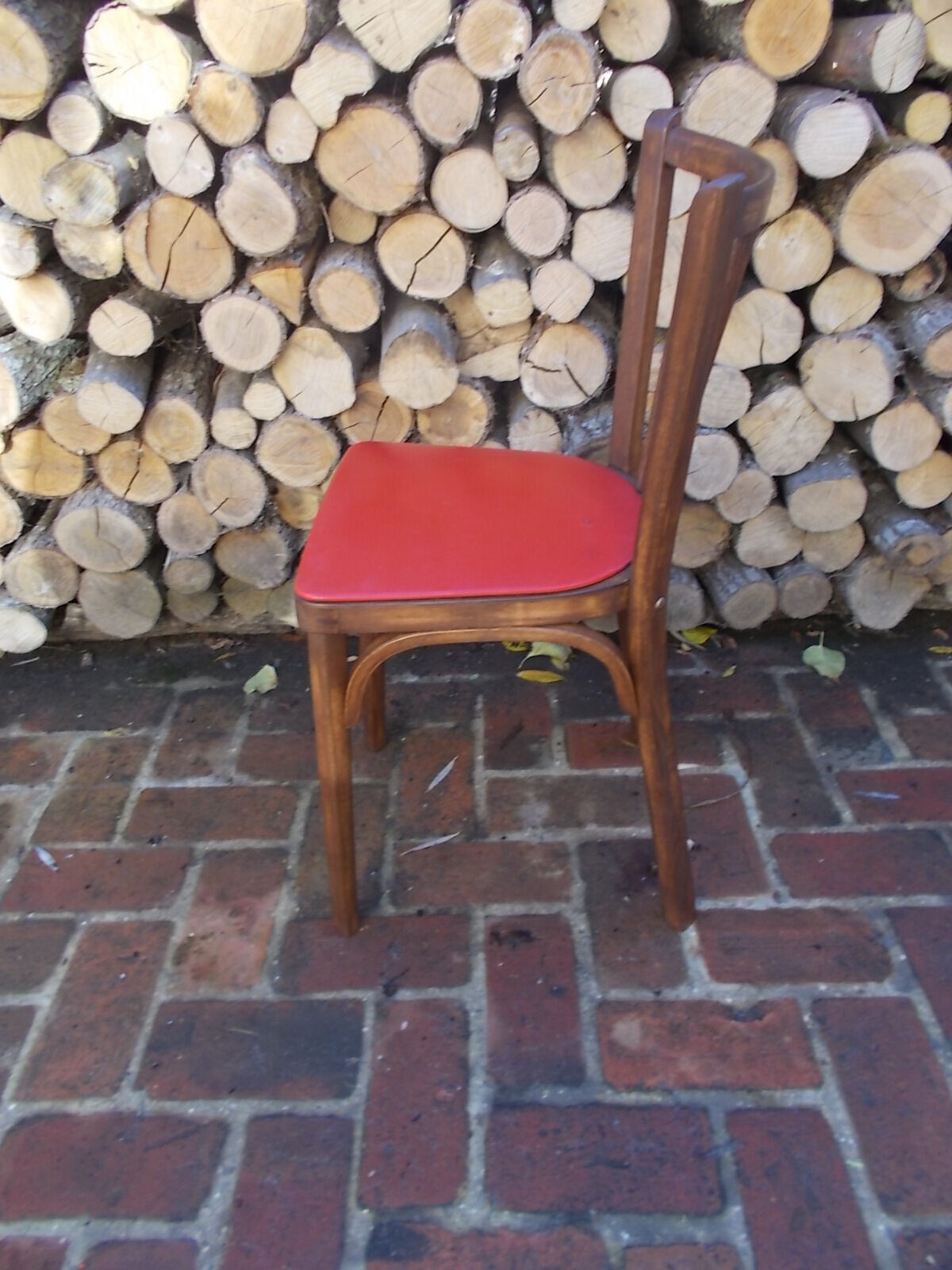 Vintage bistro chair sitting red