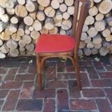 Vintage bistro chair sitting red